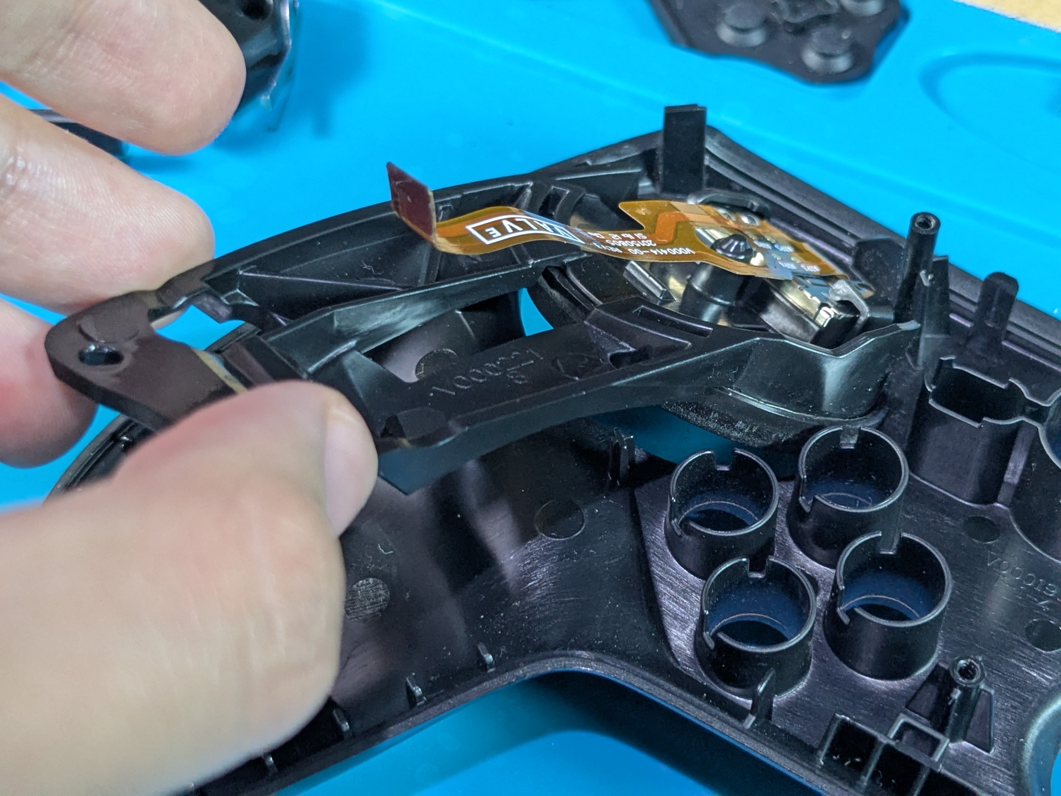 Taking_Out_Right_Trackpad